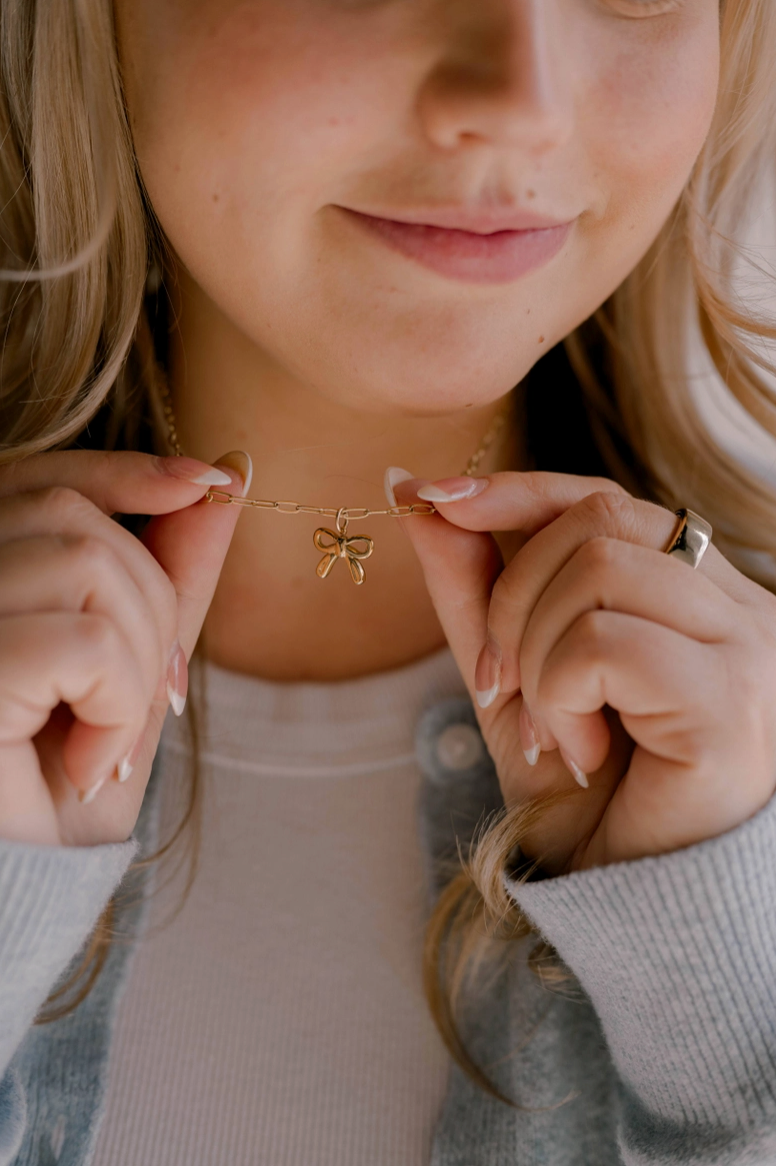 He Holds All Together Christian Charm Necklace from Southern Sunday Boutique in Naples, FL