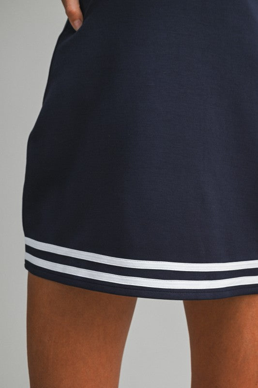 Navy & White Athletic Dress with Built In Shorts from Southern Sunday Boutique in Naples, FL
