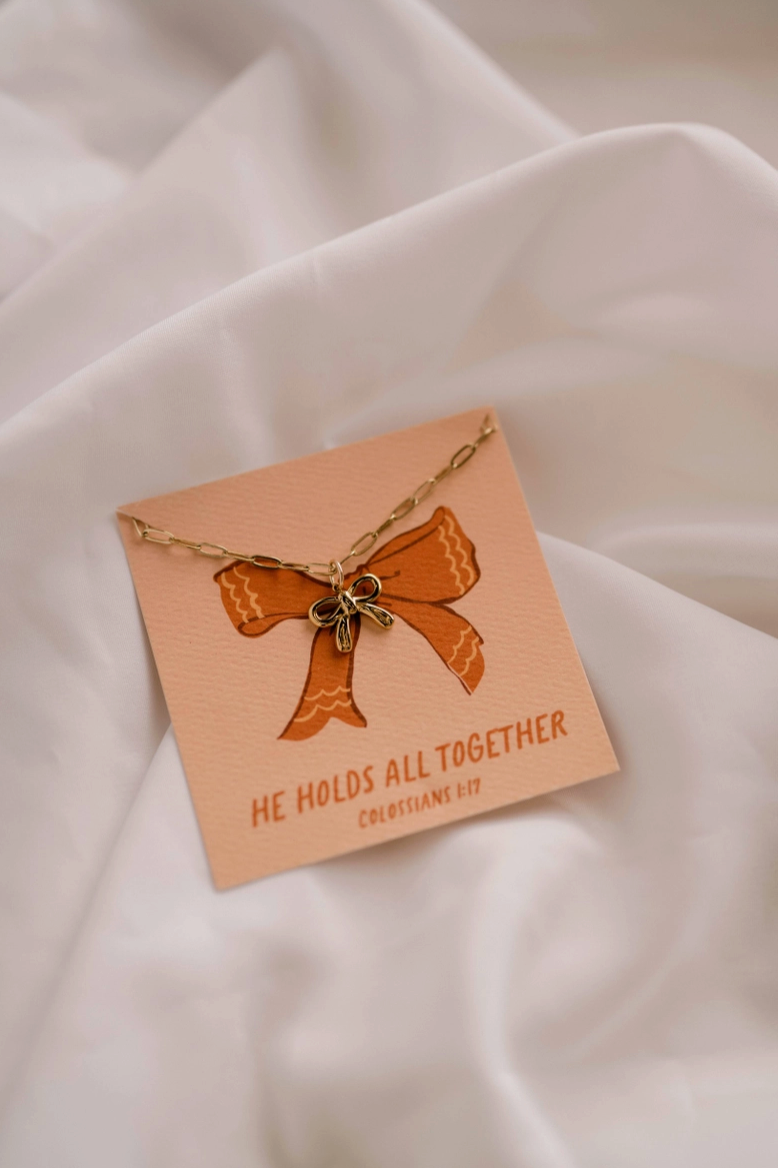 He Holds All Together Christian Charm Necklace from Southern Sunday Boutique in Naples, FL
