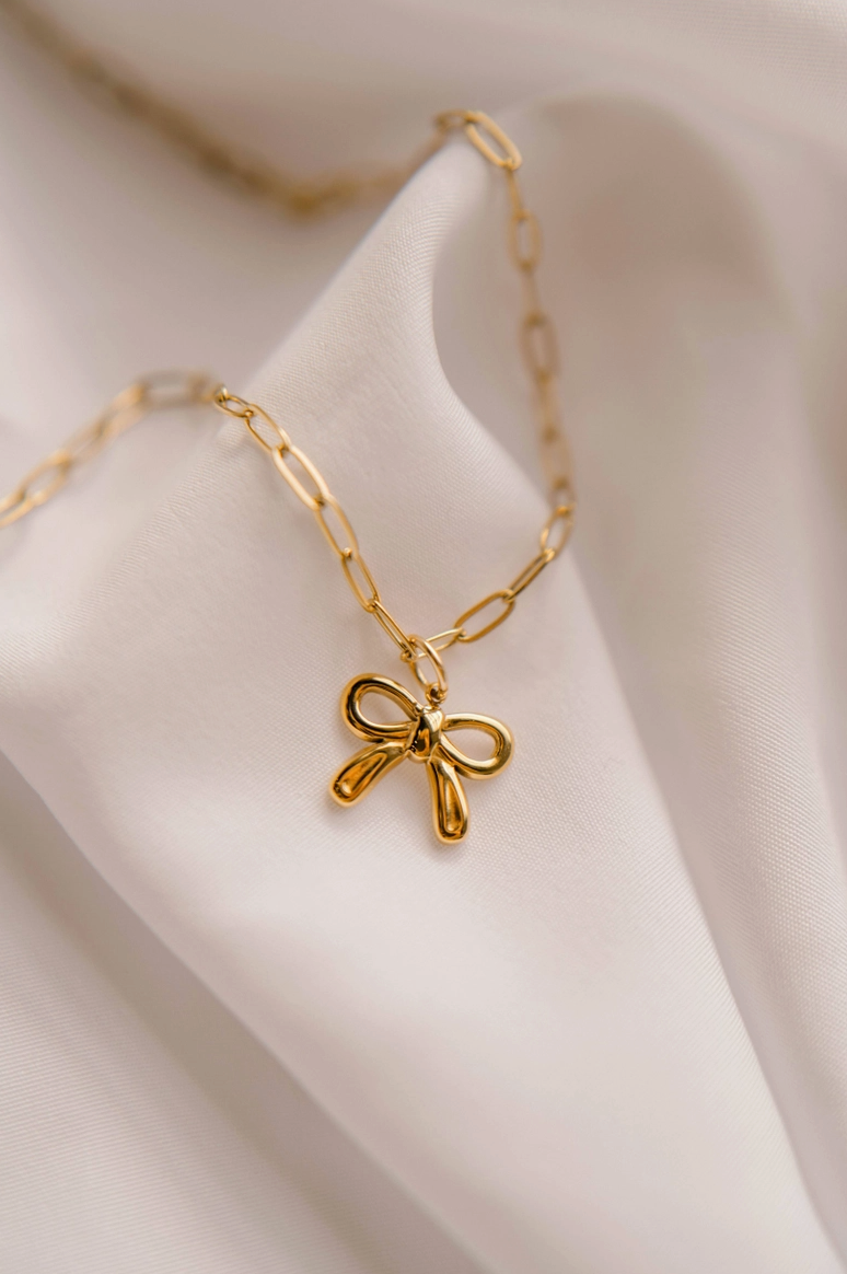 He Holds All Together Christian Charm Necklace from Southern Sunday Boutique in Naples, FL