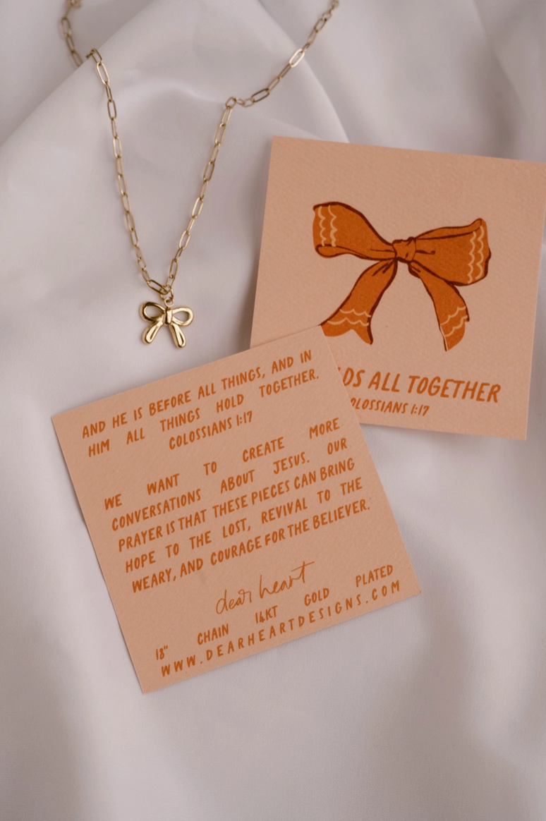 He Holds All Together Christian Charm Necklace from Southern Sunday Boutique in Naples, FL